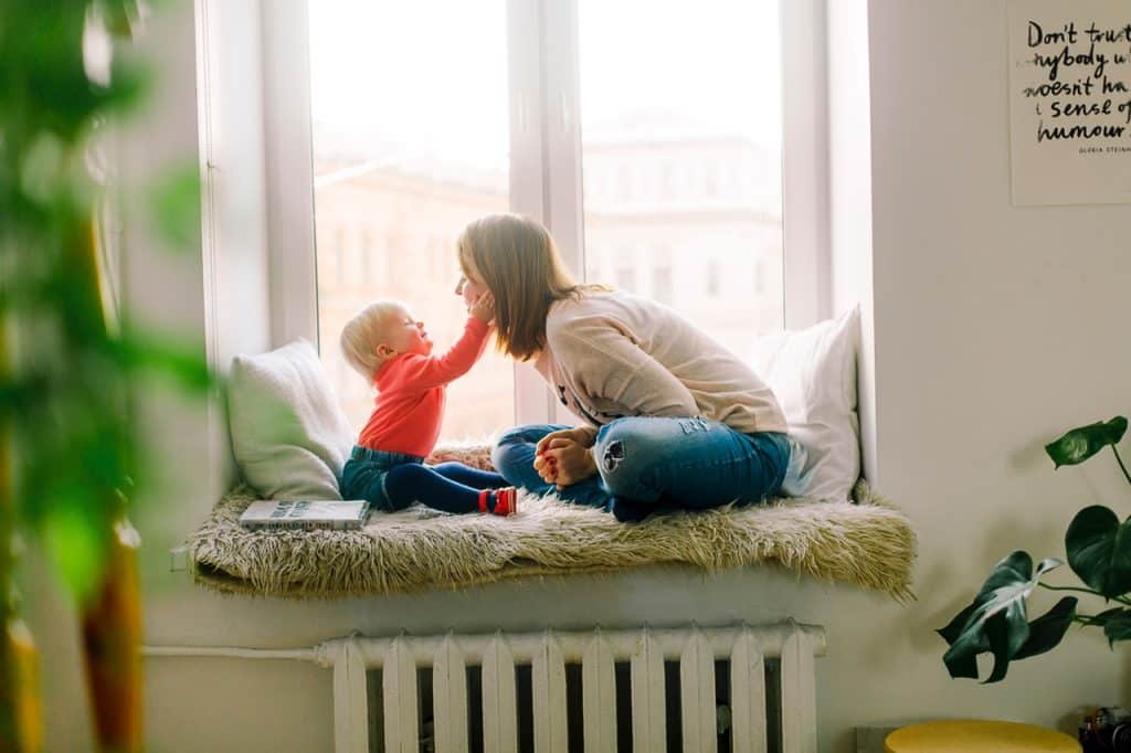 A mother and child playing