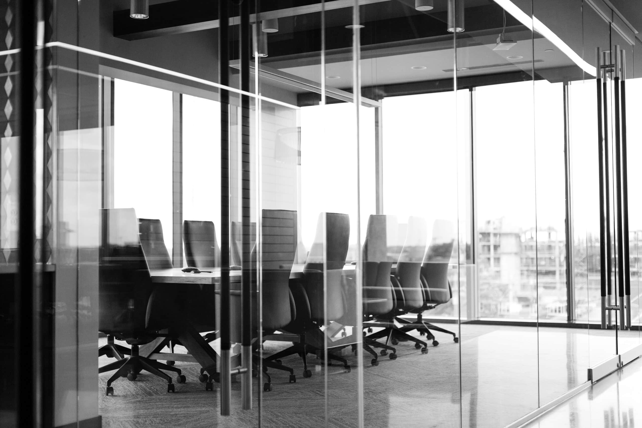 conference room surrounded by windows on a high floor