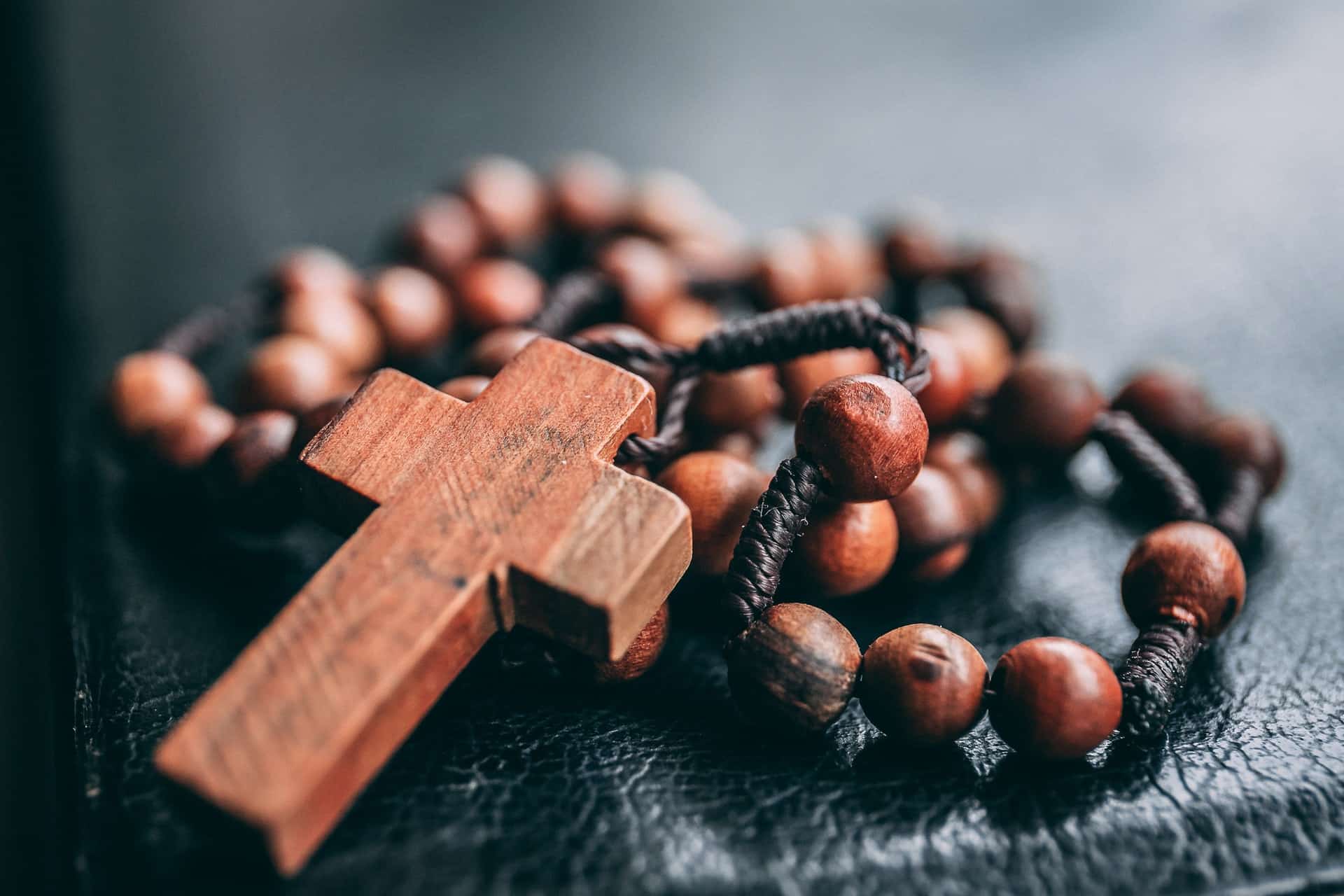 crucifix representing Roman Catholic employee