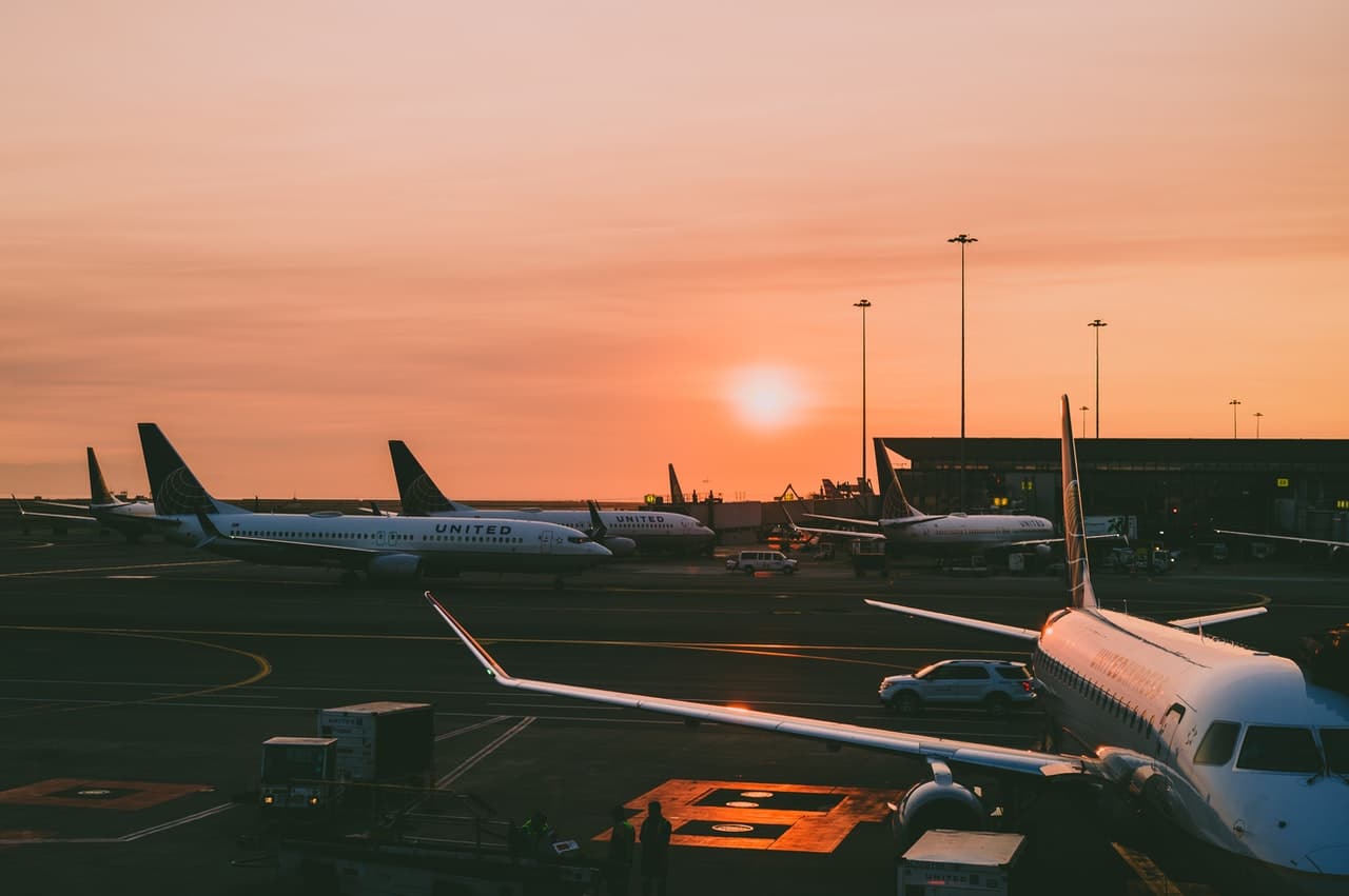 Airplanes on a tarmac representing federal workers