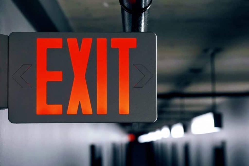 exit sign backlit in red