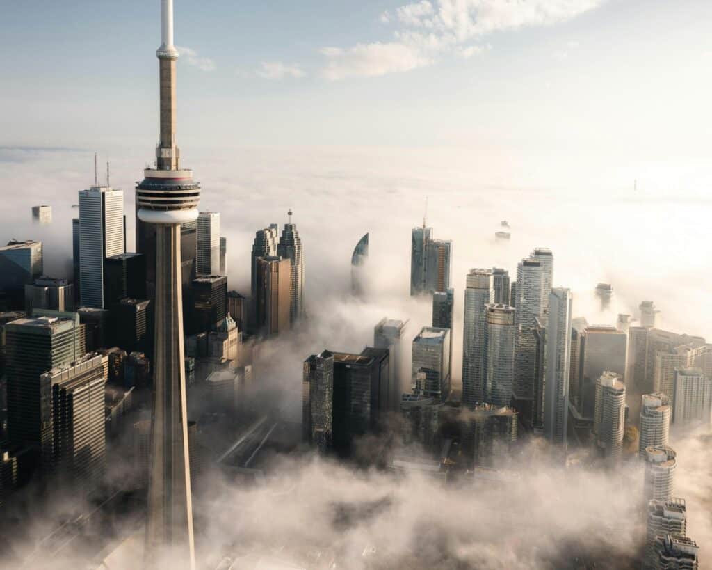 The Toronto skyline rising from the mist with the CN Tower in the foreground, representing Best Lawyers.