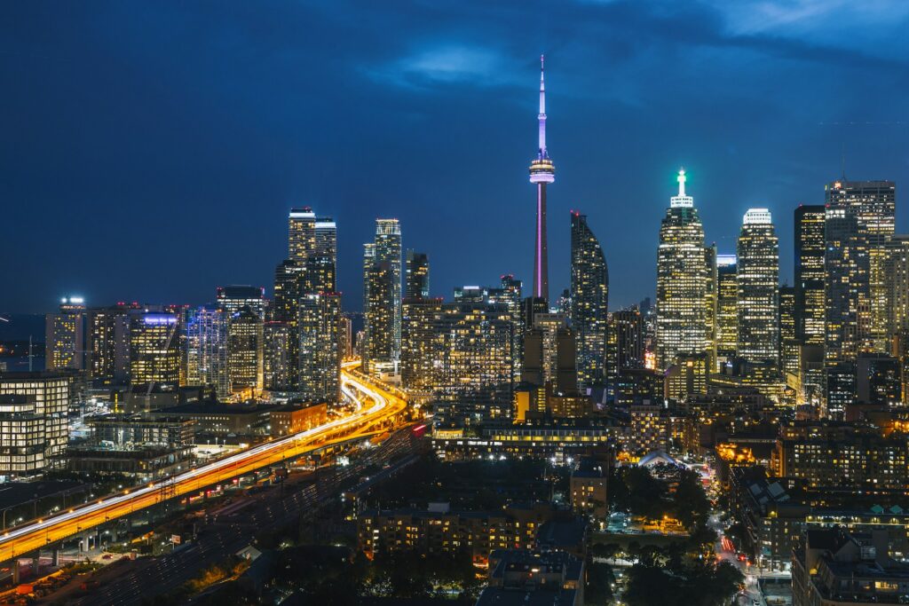 A view of the city of Toronto at night from top of a building where three employment law partners were awarded being one of the best lawyers in Canada for employment as ranked by Lexpert.